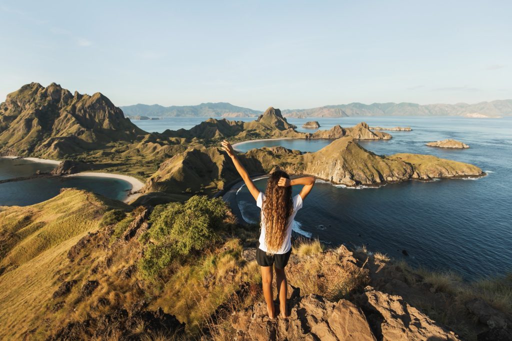 Woman with amazing view of padar island in komodo national park indonesia enjoying tropical.jpg