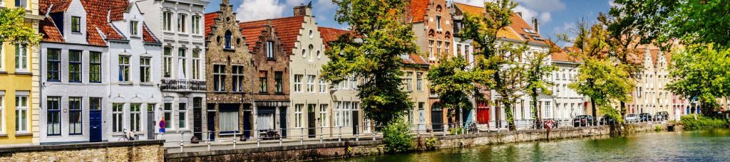 Buildings along side of a body of water.