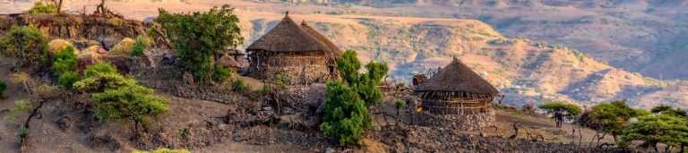 Houses on a hill, overlooking the landscape of Ethiopia