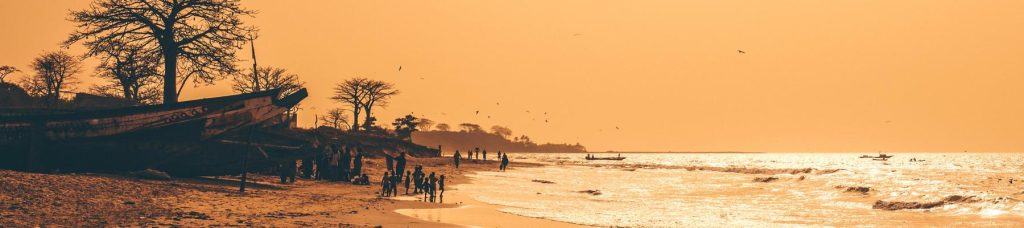 Image of the ocean at sunset in Gambia.