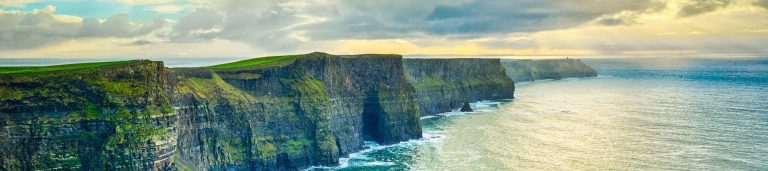 A mountain overlooking the ocean in Ireland