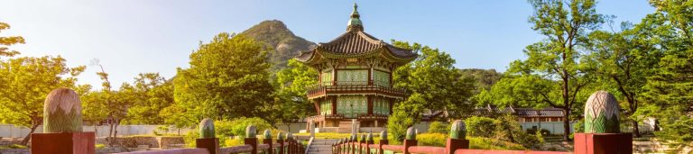 A picture of a building in the open green setting of South Korea.